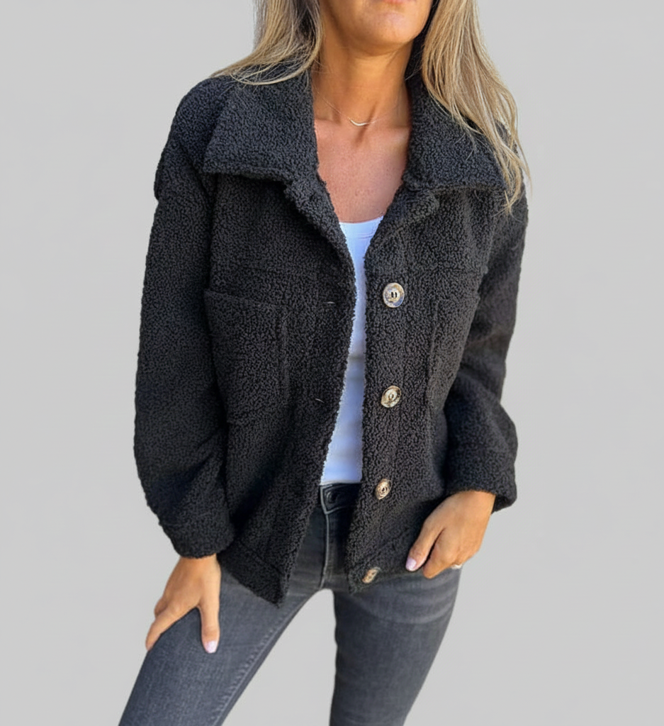 Dames herfstjas met knopen, reverskraag en praktische zakken
