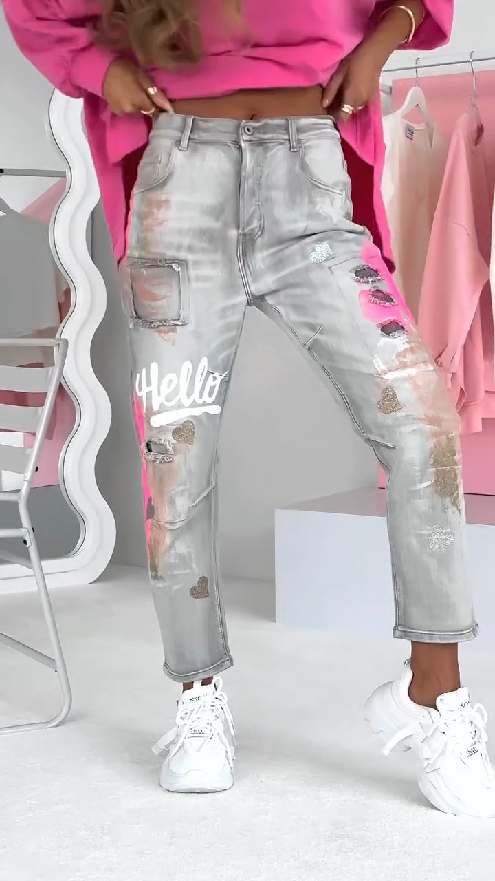 Ravelle damesjeans met ripped details en graffiti-streetstyle
