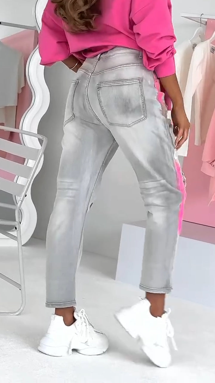 Ravelle damesjeans met ripped details en graffiti-streetstyle