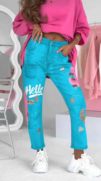 Ravelle damesjeans met ripped details en graffiti-streetstyle