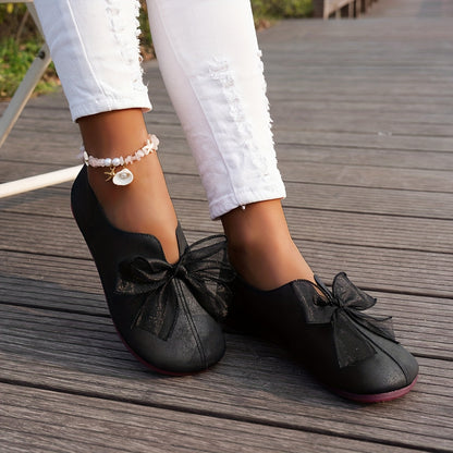 Dames ballerina's Fleur met strikdetail en platte zool