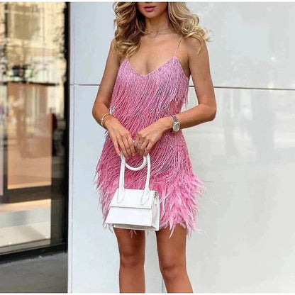 SterrenGlam Pailletten Cocktailjurk Met Veren En Glamourlook