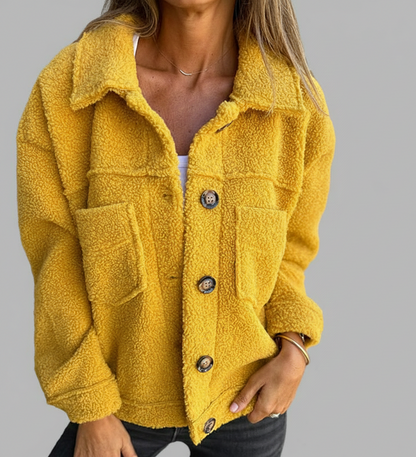 Dames herfstjas met knopen, reverskraag en praktische zakken