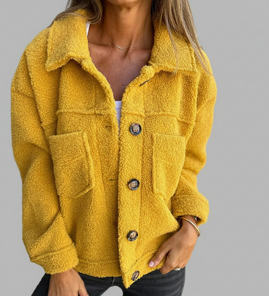 Dames herfstjas met knopen, reverskraag en praktische zakken