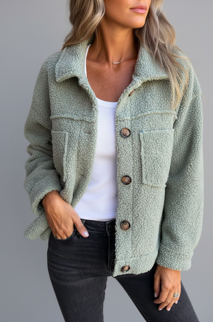 Dames herfstjas met knopen, reverskraag en praktische zakken