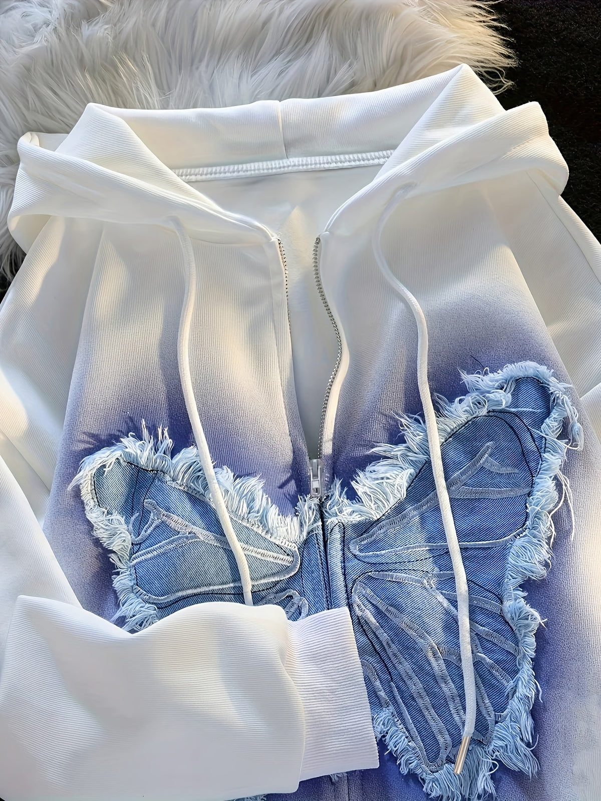 Witte hoodie met rits en vlinderdetail, unisex