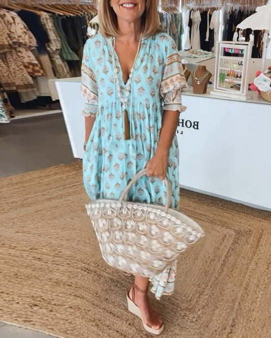 Marit Luchtige Strandjurk Dames met V-Hals en Zomerprint