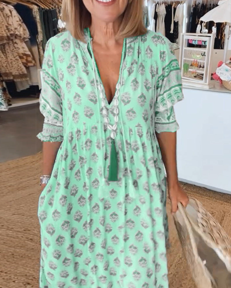 Marit Luchtige Strandjurk Dames met V-Hals en Zomerprint