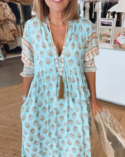 Marit Luchtige Strandjurk Dames met V-Hals en Zomerprint